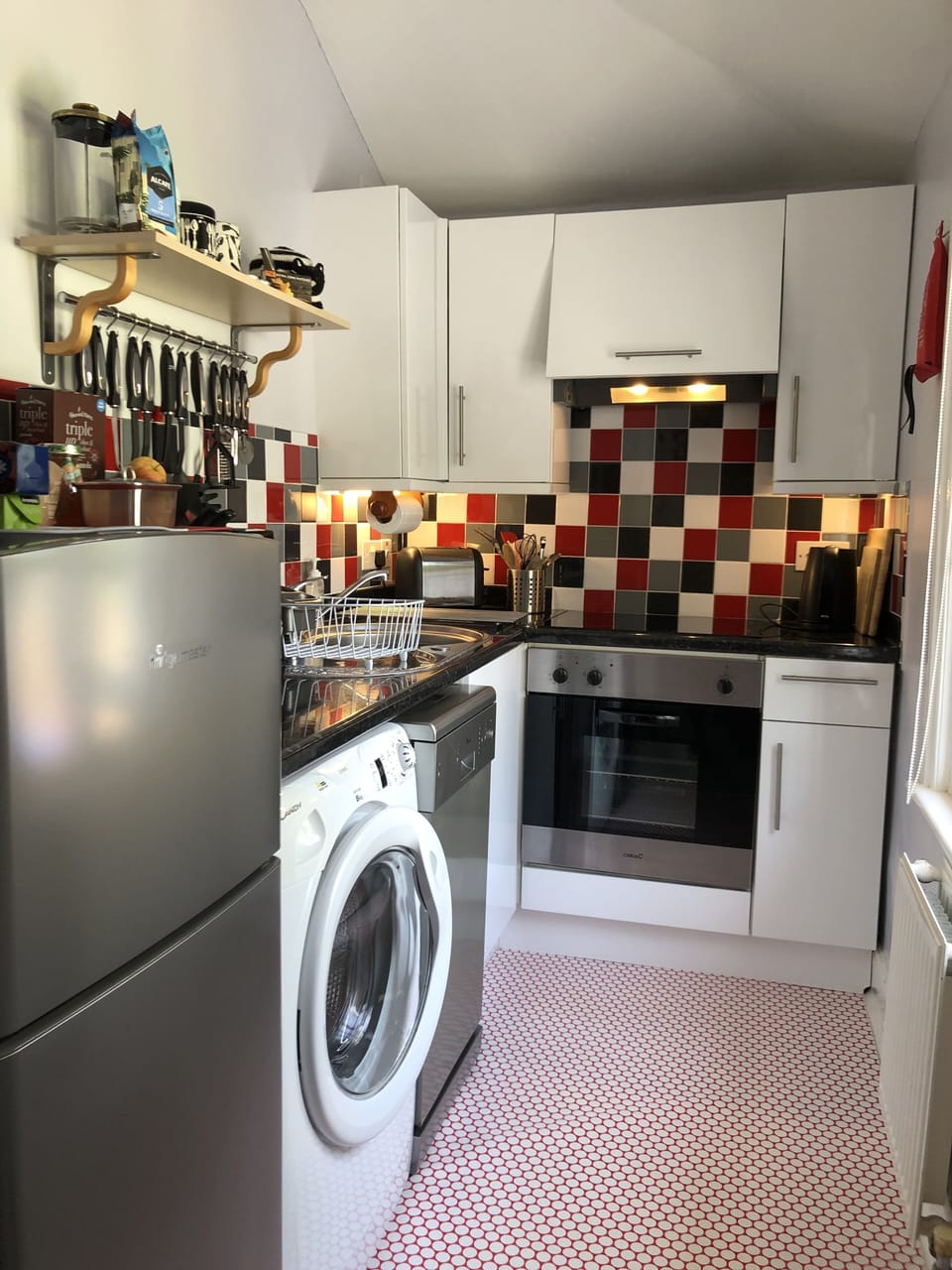 Fully fitted kitchen with oven, hob, microwave, washing machine and dishwasher 
