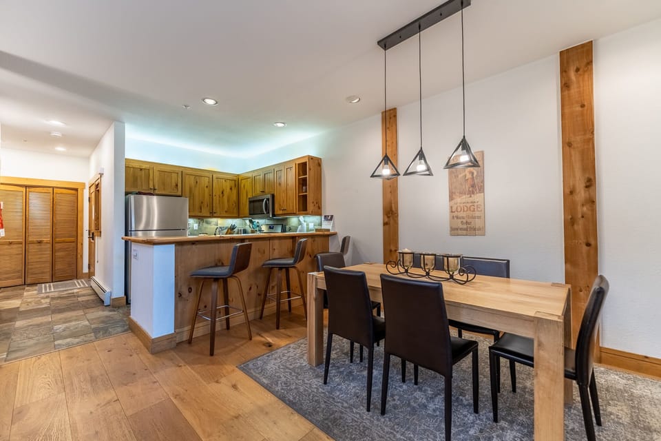 Your open-concept kitchen flows seamlessly into a warm dining space where you'll share memorable meals with loved ones.