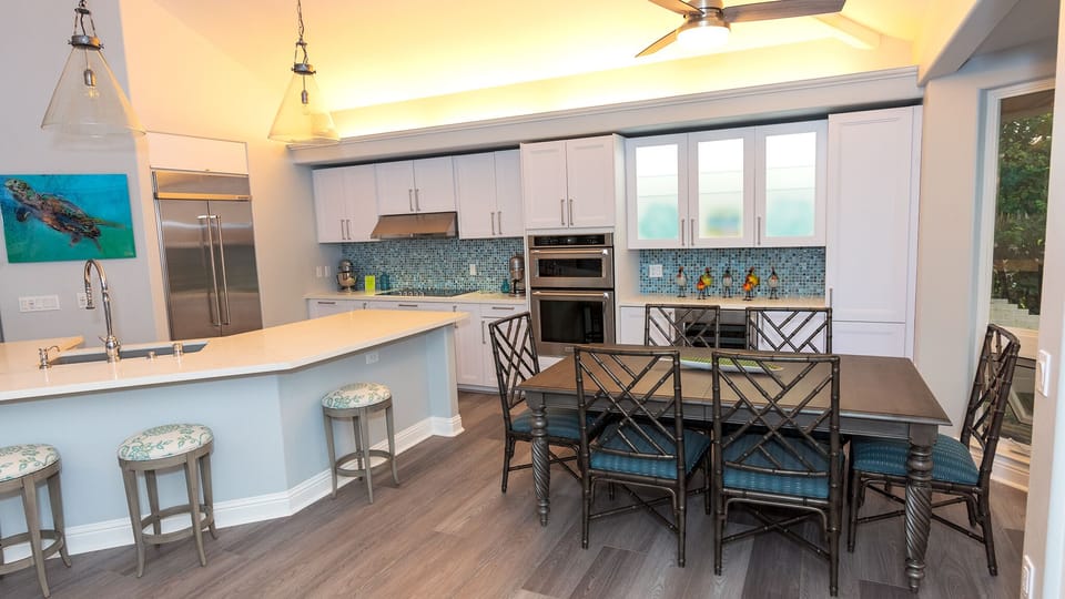 Ethen Allen kitchen table. chairs and 360 rotating bar stools.