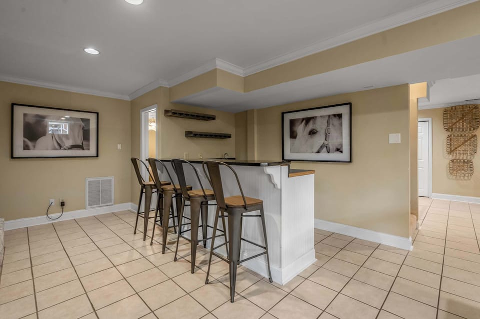 Pull up a
barstool and pour a
round for the group
— this is where your
night downstairs
really gets going.