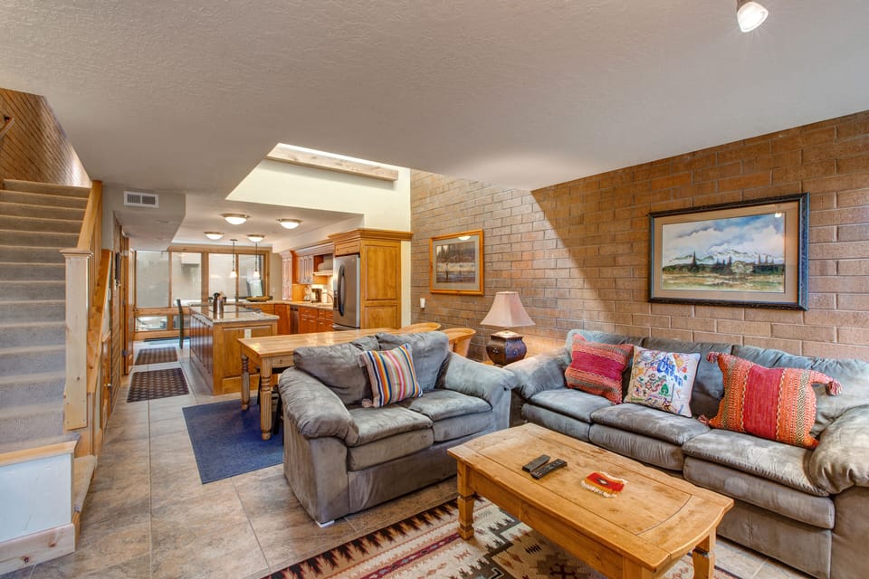 Main Level Living Room, Dining Area and Kitchen with Plenty of Natural Light