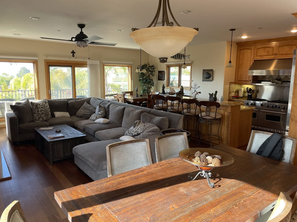 Living room and kitchen with ocean view