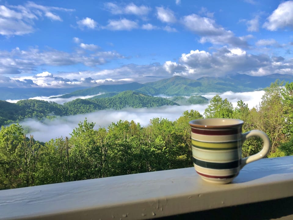 Watch the fog spill over the mountains