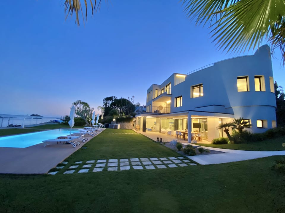 The villa in its splendor at dusk