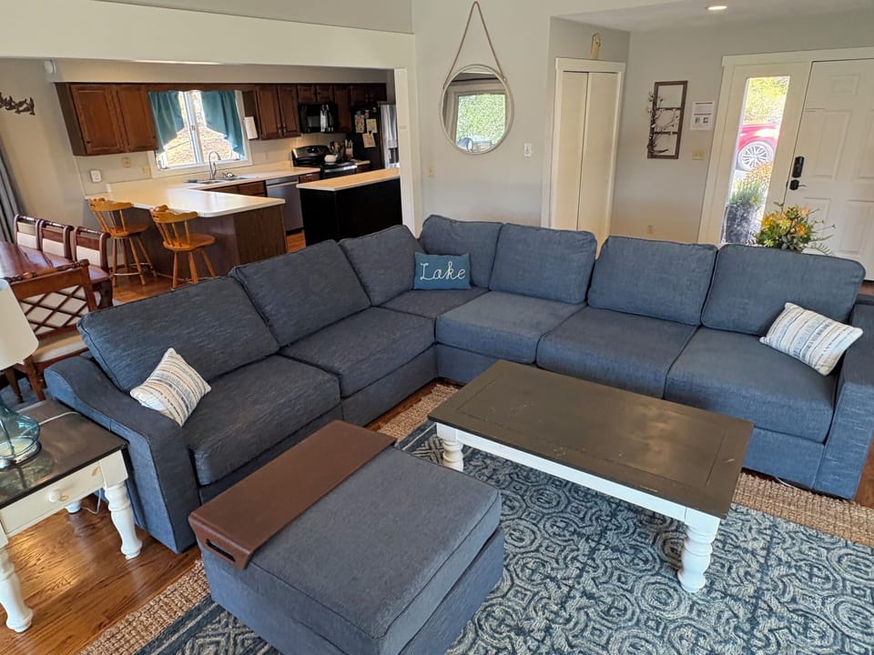 Living Room Upstairs, Kitchen with updated dishwasher and Stove.