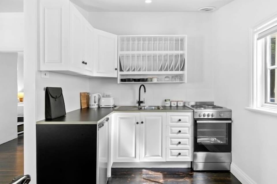Fully equiped kitchen with new cooktop/oven & microwave. Tea/coffee provided.