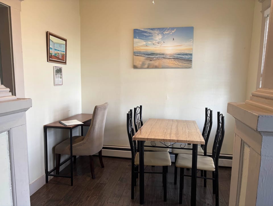 Sunny dining area with workspace