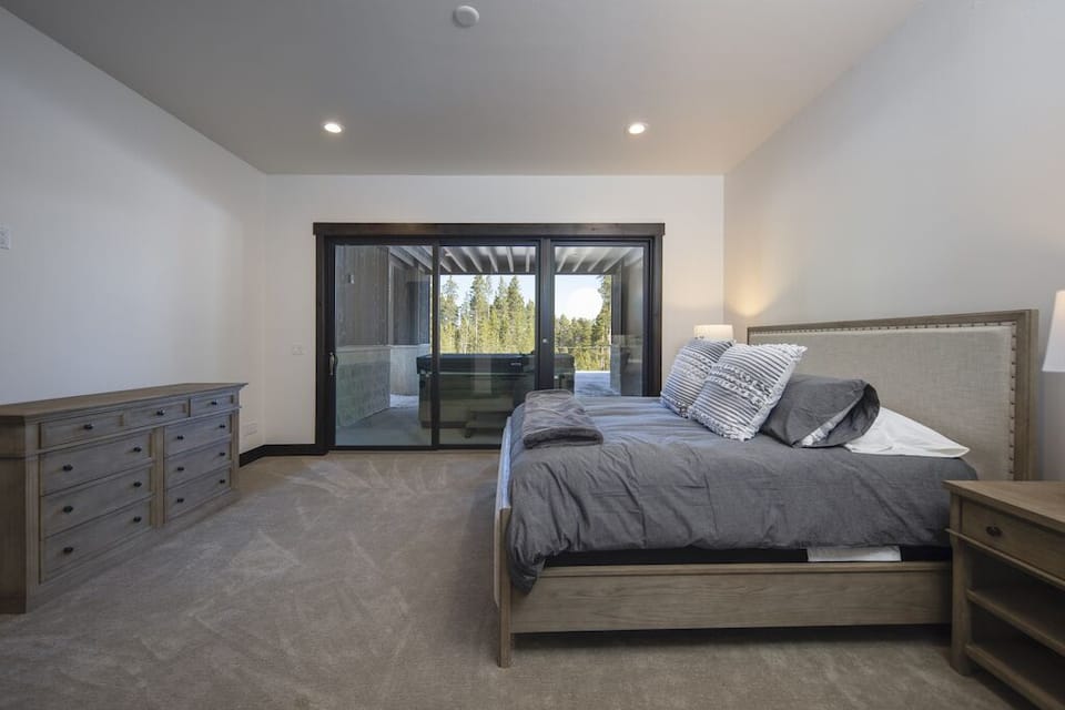 Bedroom #3 (lower-level): King size bed, walk-in closet, private en suite bath