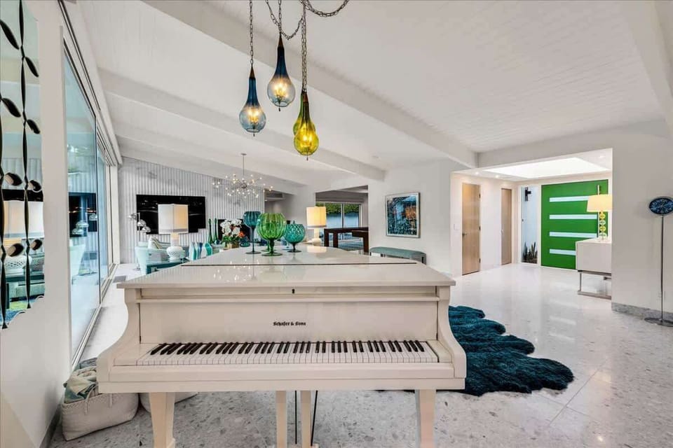 Create lasting memories around the baby grand piano, where you can play your favorite show tunes and let the music take you away. Gather friends for a night of laughter and fun, as melodies fill the air and joy abounds!