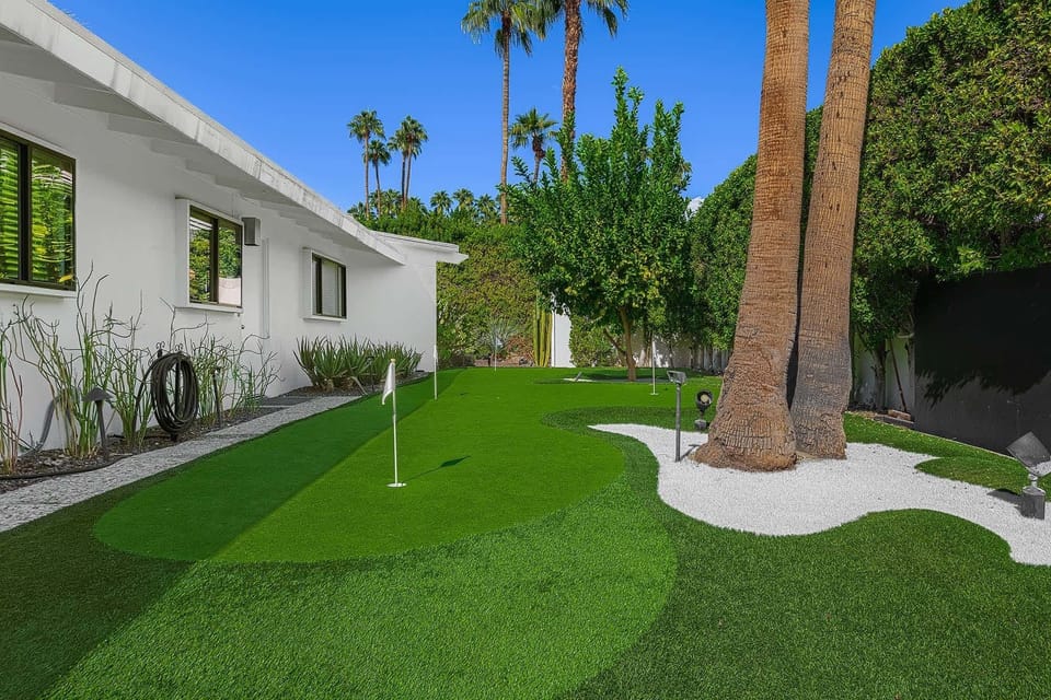 Sharpen your putting skills on the impeccably designed putting green, a golfer’s paradise right in your backyard. Perfect for guests of all skill levels, this lush, green space offers hours of entertainment and relaxation.