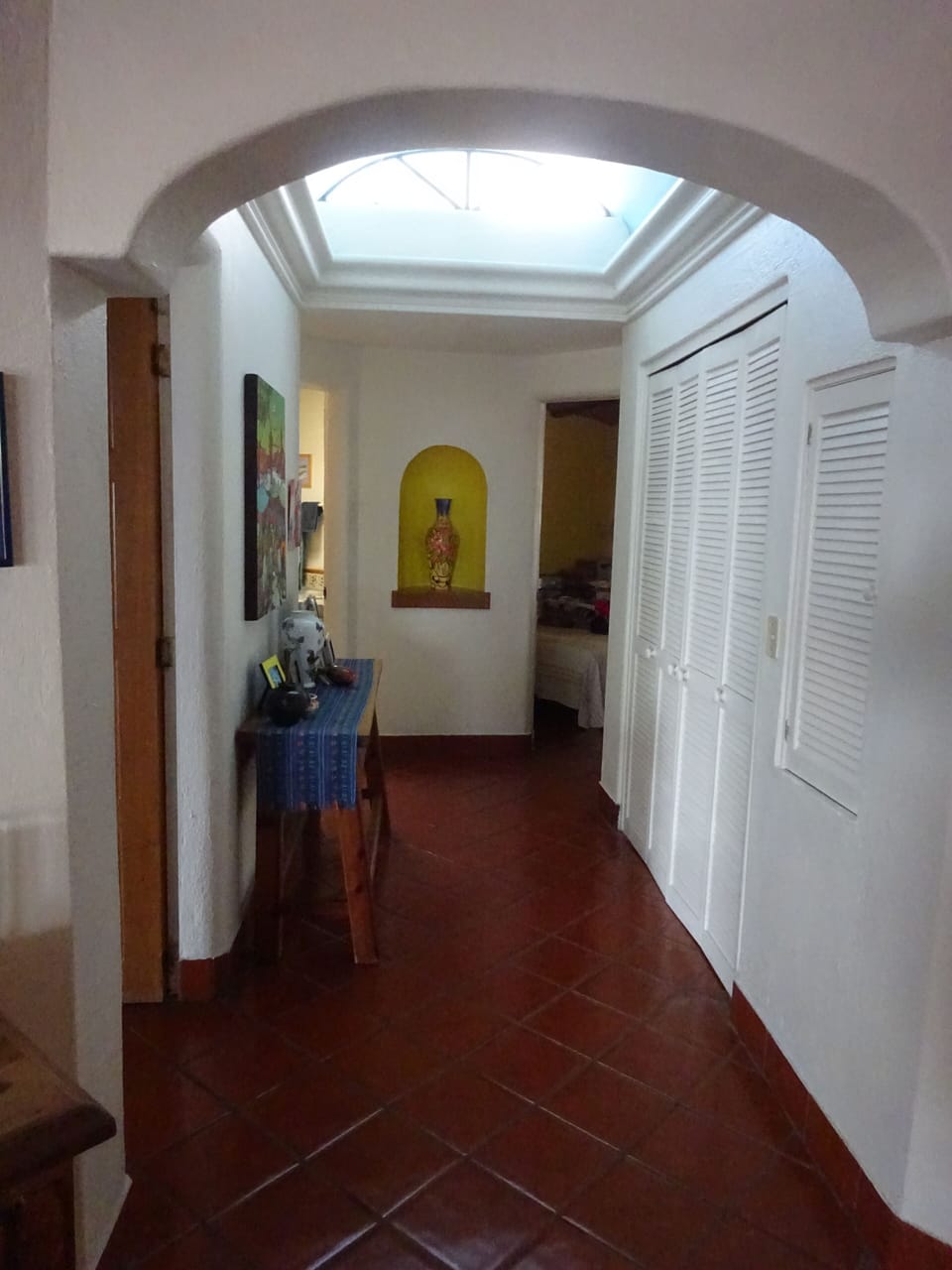 Hallway with Laundry room on the right