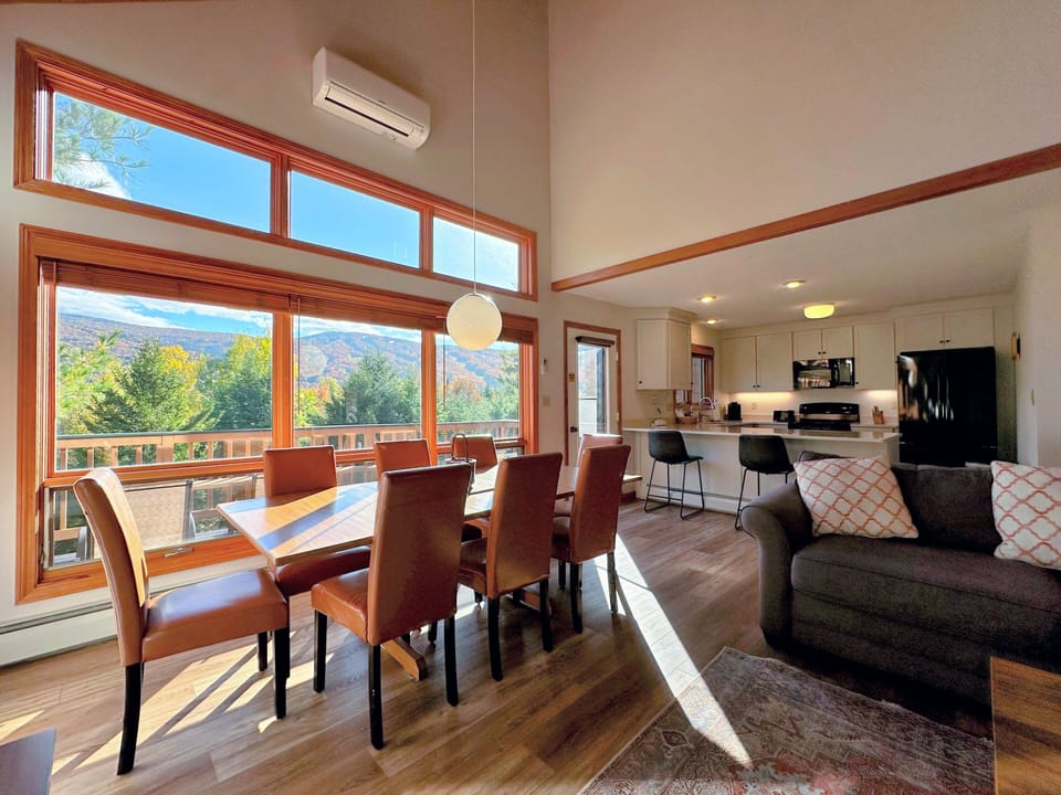 Gather around with family and friends in this sophisticated dining space with incredible views!