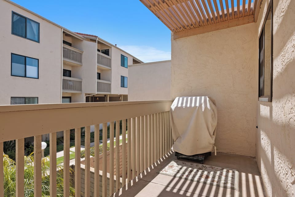 Back Balcony next to Kitchen with BBQ Grill