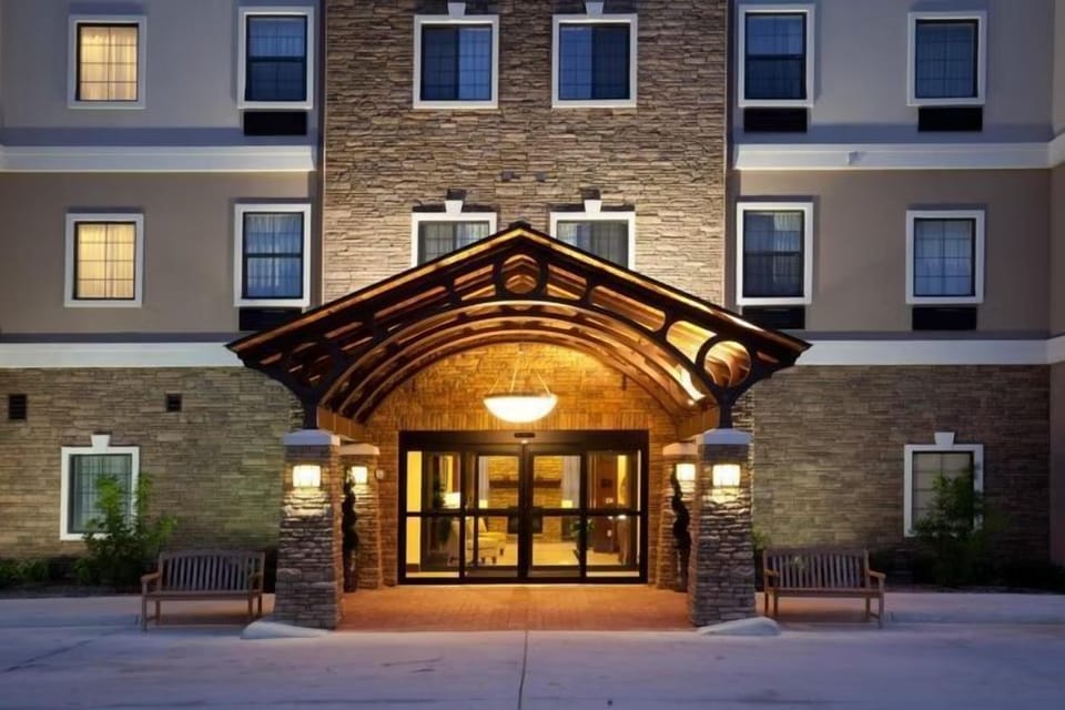 Building exterior featuring decorative arched entrance