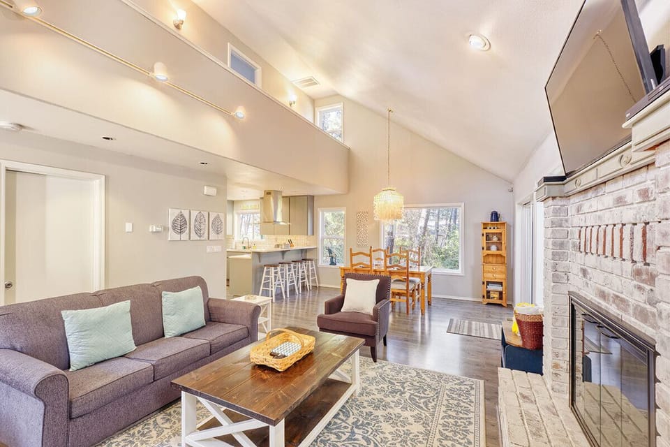 Living room leads right into the dining and kitchen area