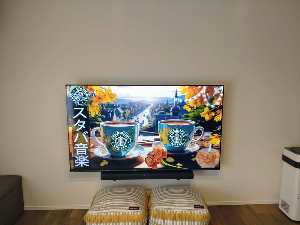 The lounge has a 65-inch large TV.