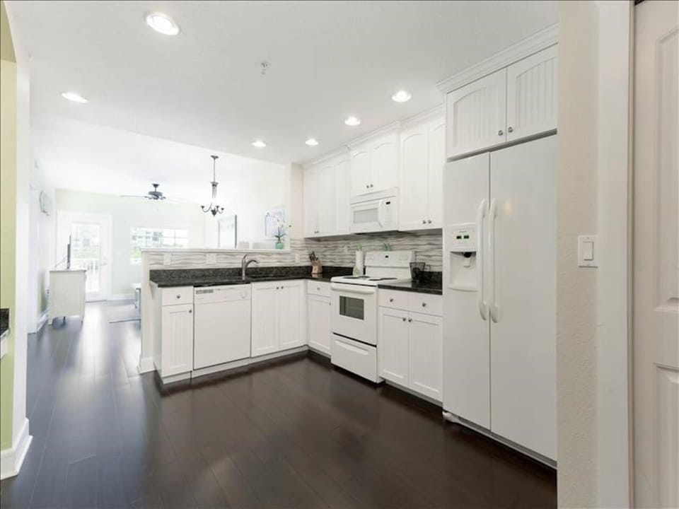 View from entrance - fully stocked kitchen