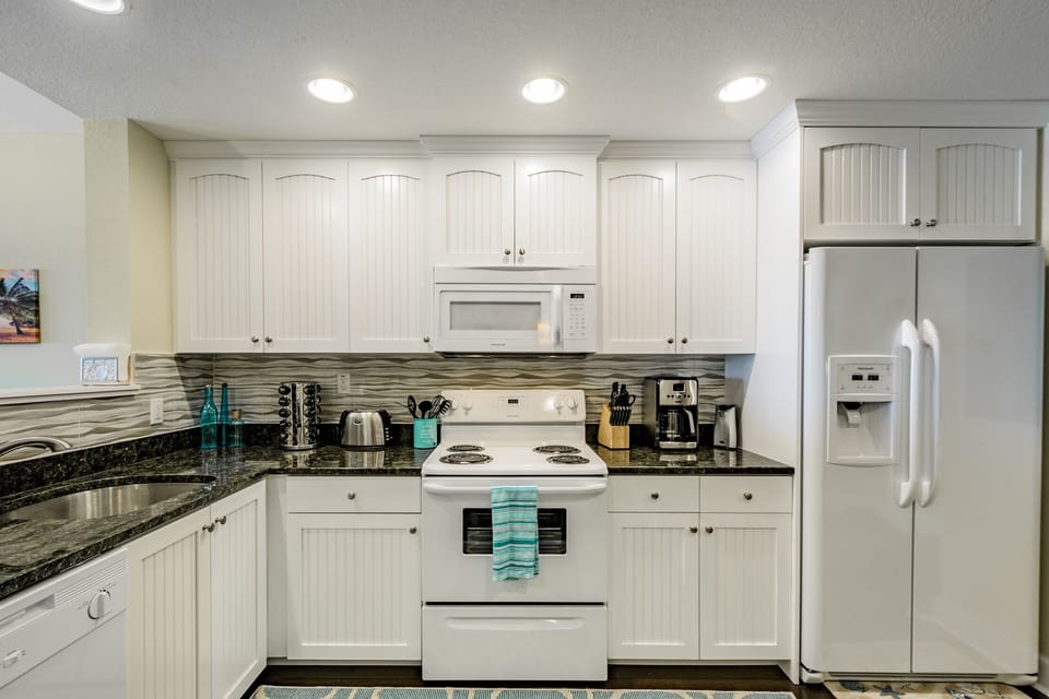 Fully equipped kitchen with a Krups  coffee pot