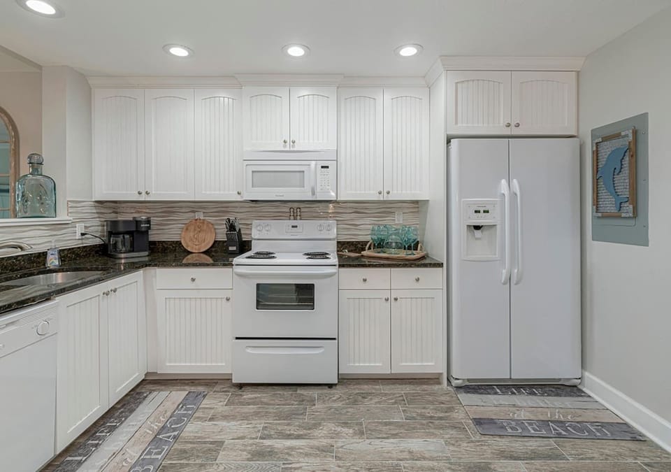 Another view of the unit's full equipped kitchen