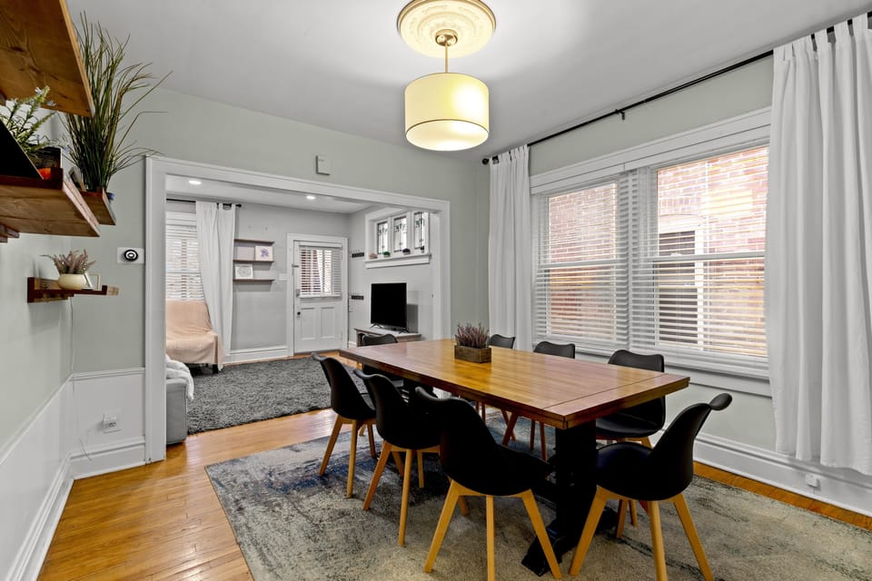 Solid wood dining room table excellent for communing, working or playing