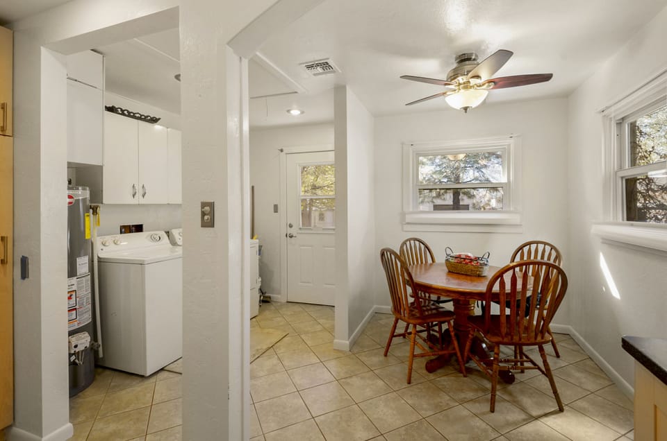 Washer and Dryer next to kitchen
