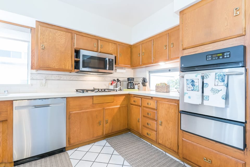 The kitchen is stocked with dishes, utensils, cookware, bakeware, small appliances, and all large appliances.
                