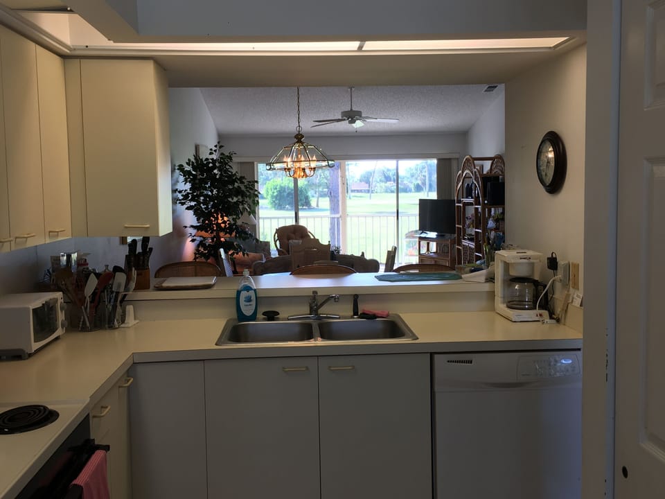Kitchen Looking toward Dining Area, Living Area, Lanai and Golf Course