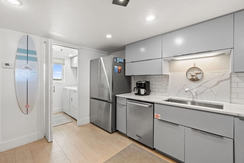 High-End Stainless appliances in the kitchen of SurfDweller703 - Customized Cabinetry is just another first class amenity to this beautiful Gulf front unit. Prepare your family's next meal in this beautiful kitchen.