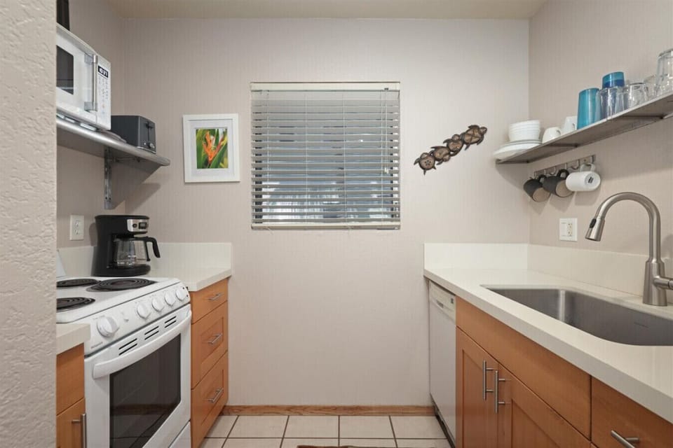 The condo has a full kitchen