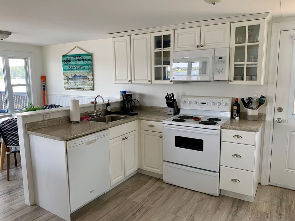 All Amenities Stove, Dishwasher, Microwave, Water Cooler And Washer And Dryer.