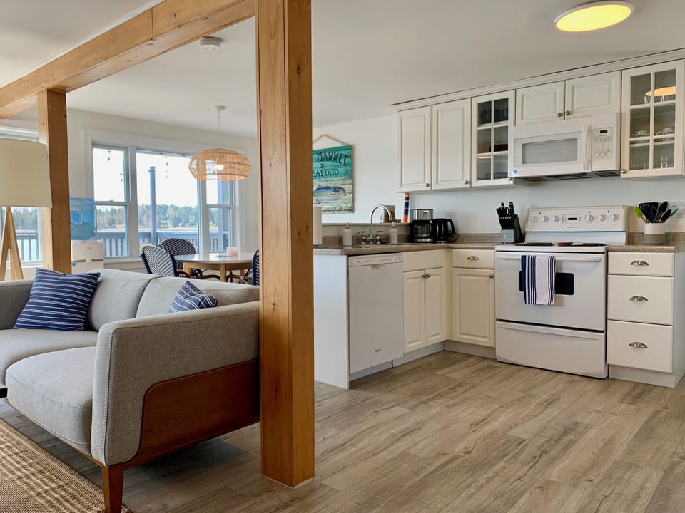 Full Kitchen With All Amenities. Including Dishwasher And Water Cooler. 