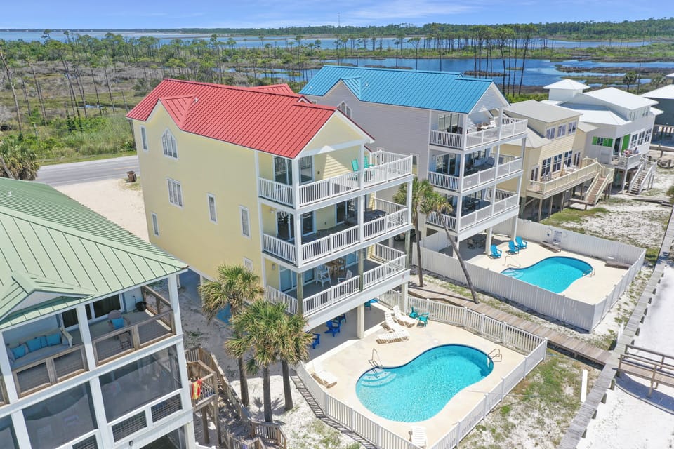 Beachfront Home with Pool and Bay in Background