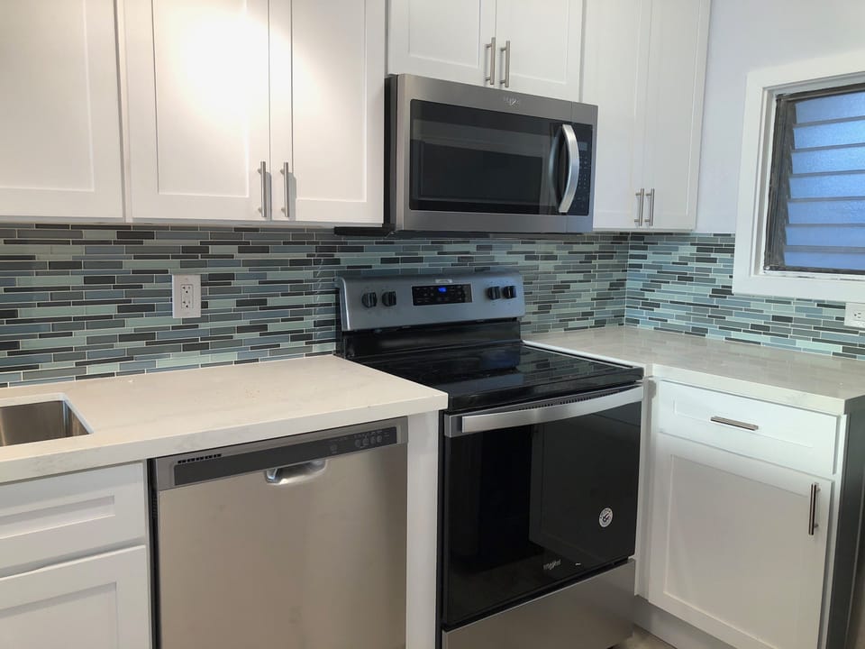 New kitchen tiled with all the colors of the sea