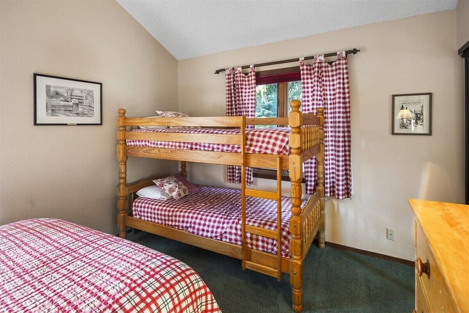 Nice third bedroom with a bunk bed