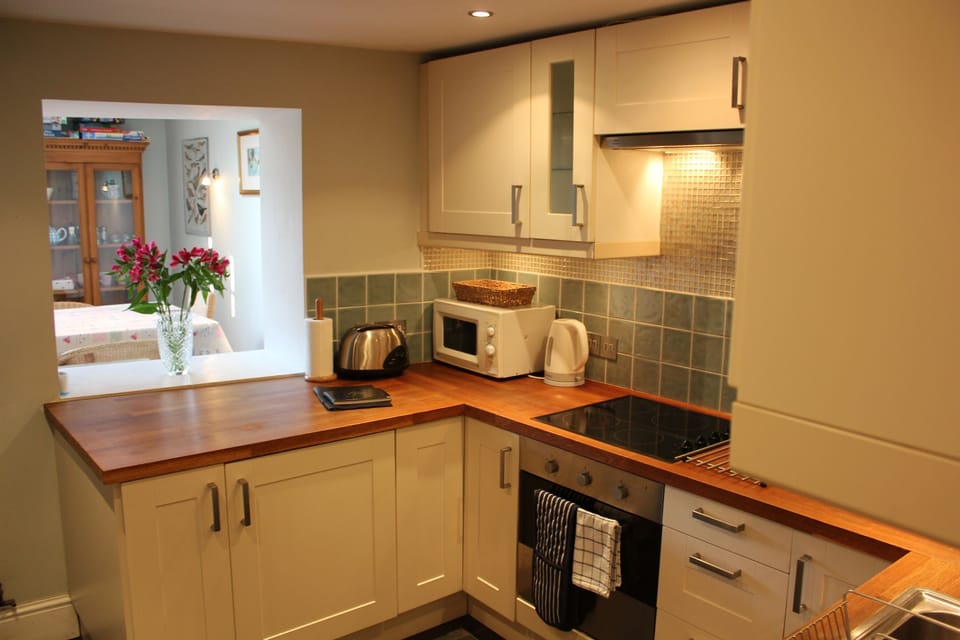 Kitchen with view through to dining room
