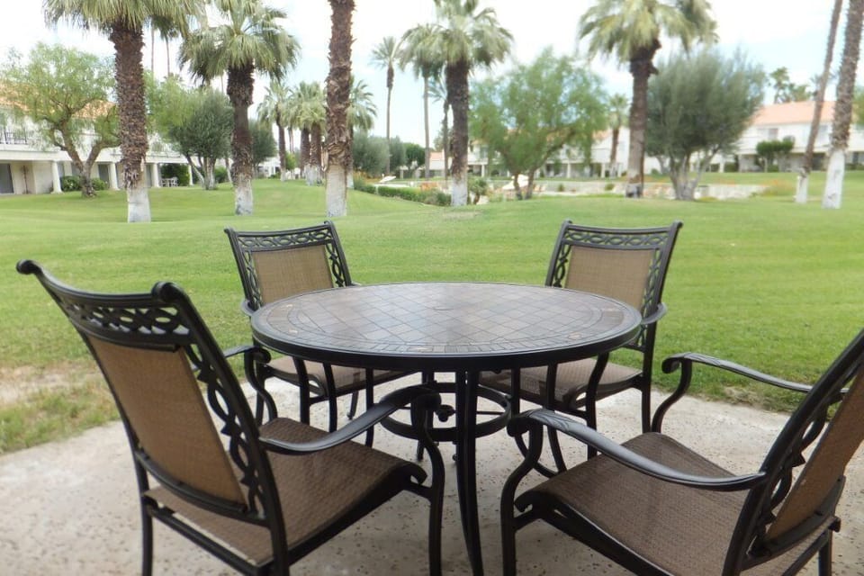 Six chairs, table, chaise lounge & side tables make the patio very comfortable