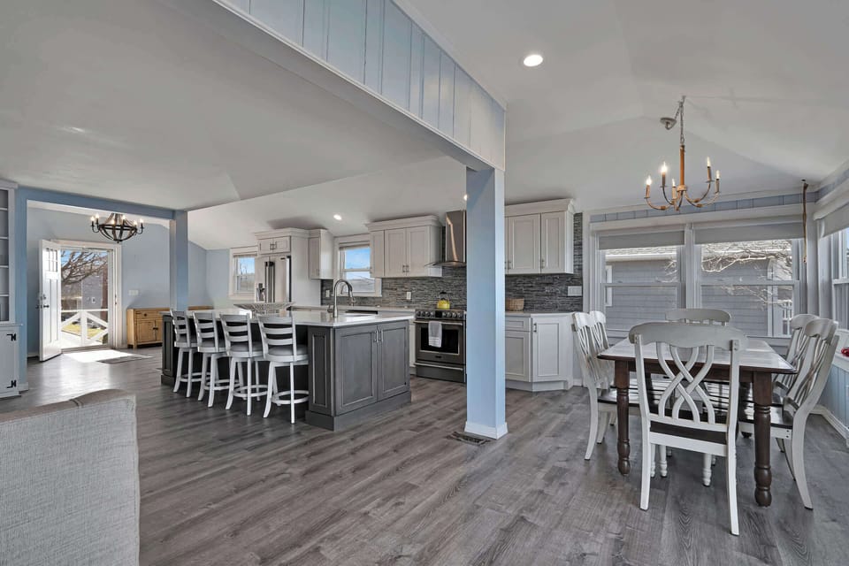 Modern kitchen seamlessly integrated with a welcoming dining space.