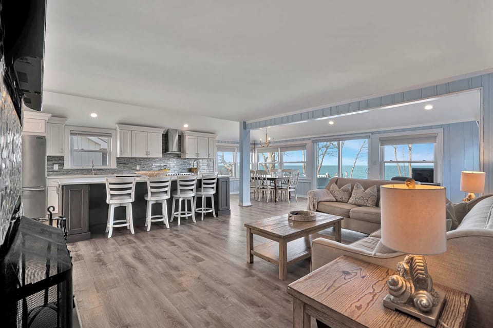 The Stella Beach House's open plan living room with view to kitchen and dining area