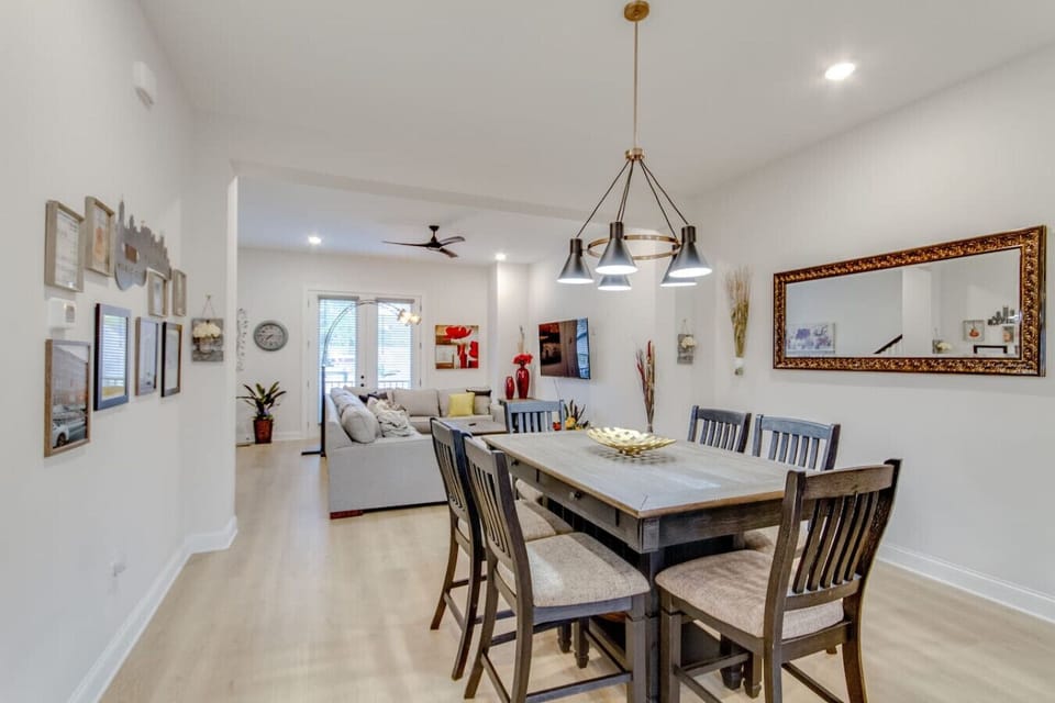 Sleek glass-enclosed shower with modern tile surround
