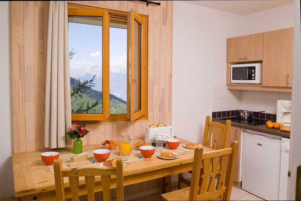 Share meals and laughs at the dining table.