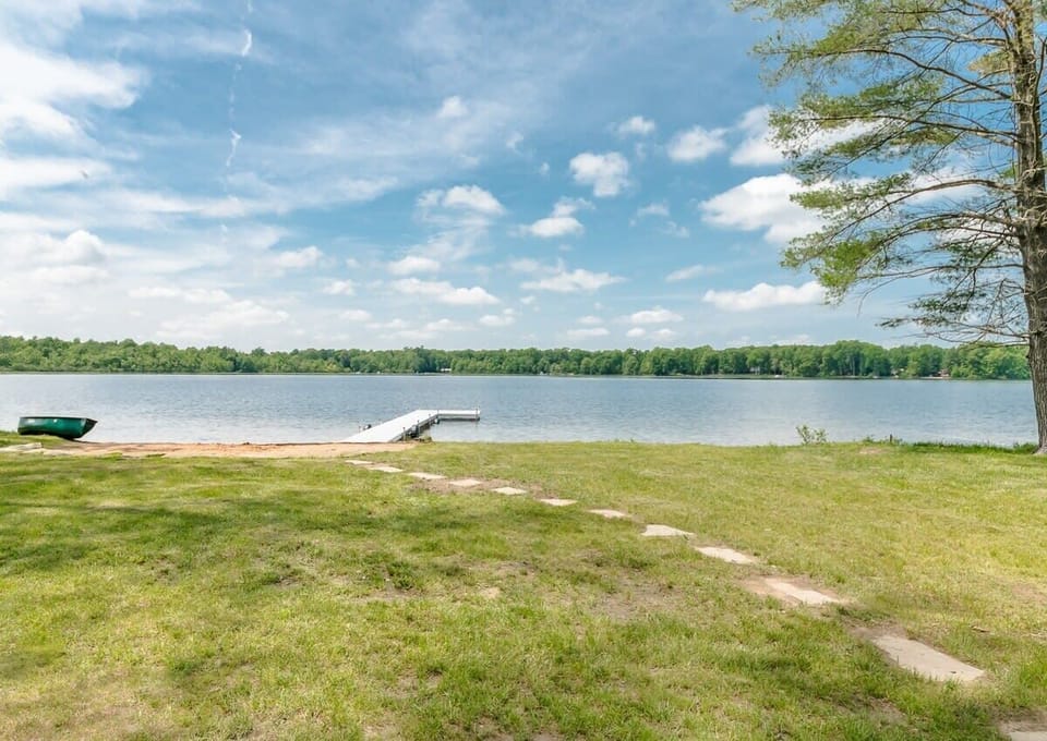 Approaching Upper Scott Lake from the fire pit area of our home next door, Swan Shores
