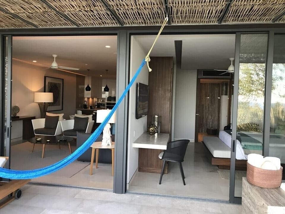 large sliding glass doors open living room &master to the patio and ocean sounds