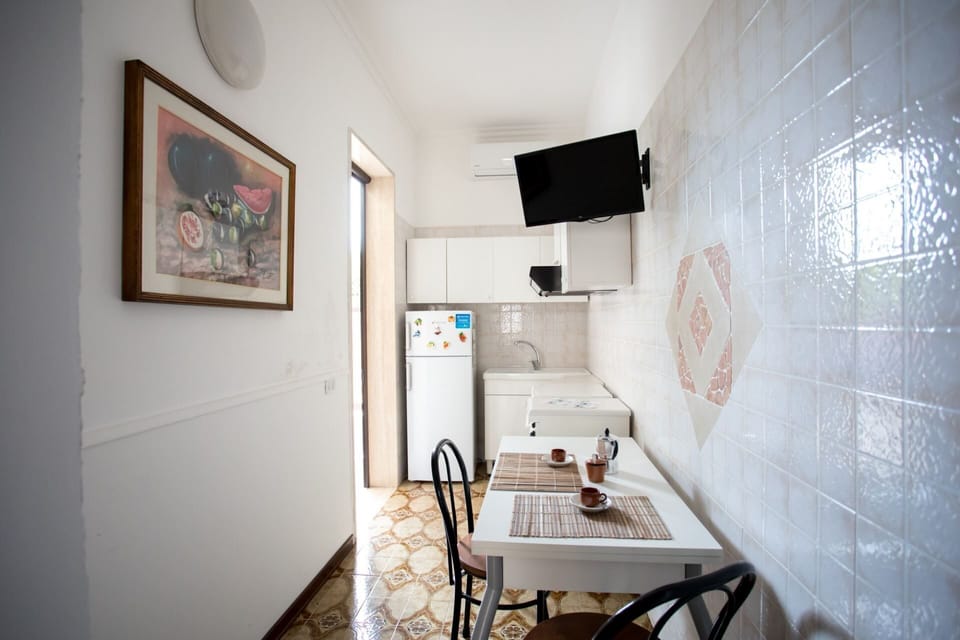 Entrance with kitchenette