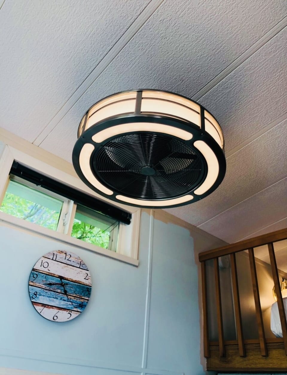 Fandalier next to loft - blades are enclosed for safety.