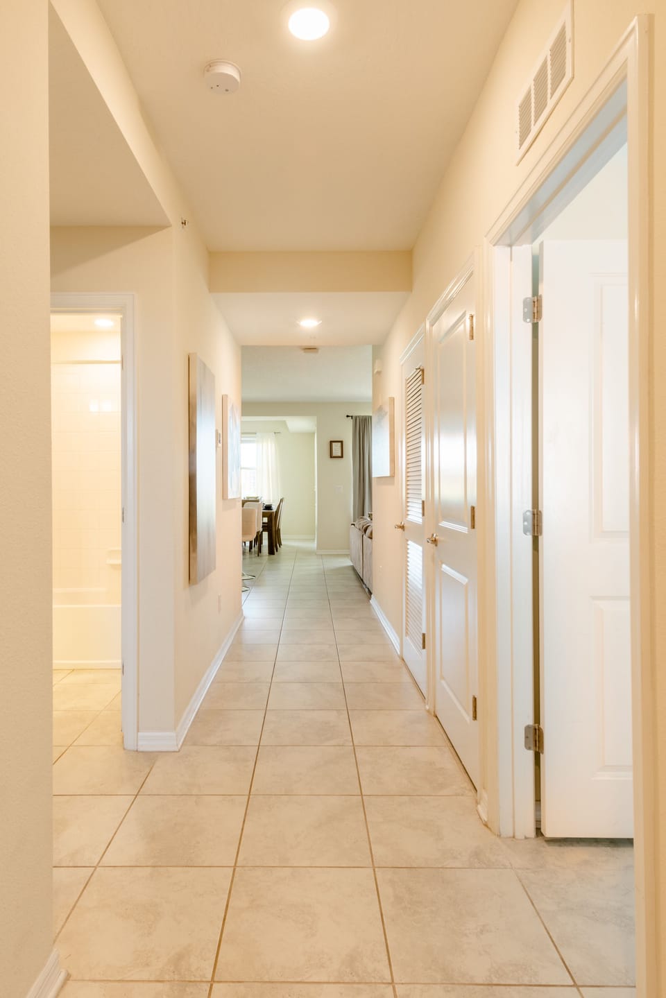 This bright hallway leads you from the entrance to the living spaces.