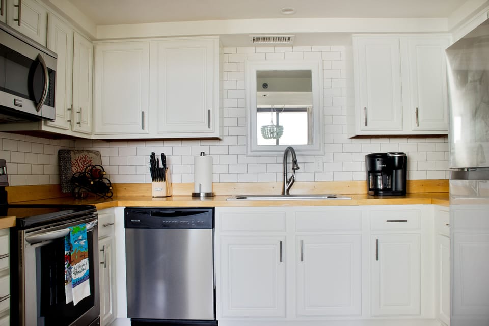 Stainless steal appliances and well stocked kitchen for all your cooking needs