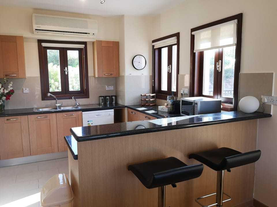 open space kitchen with bar counter