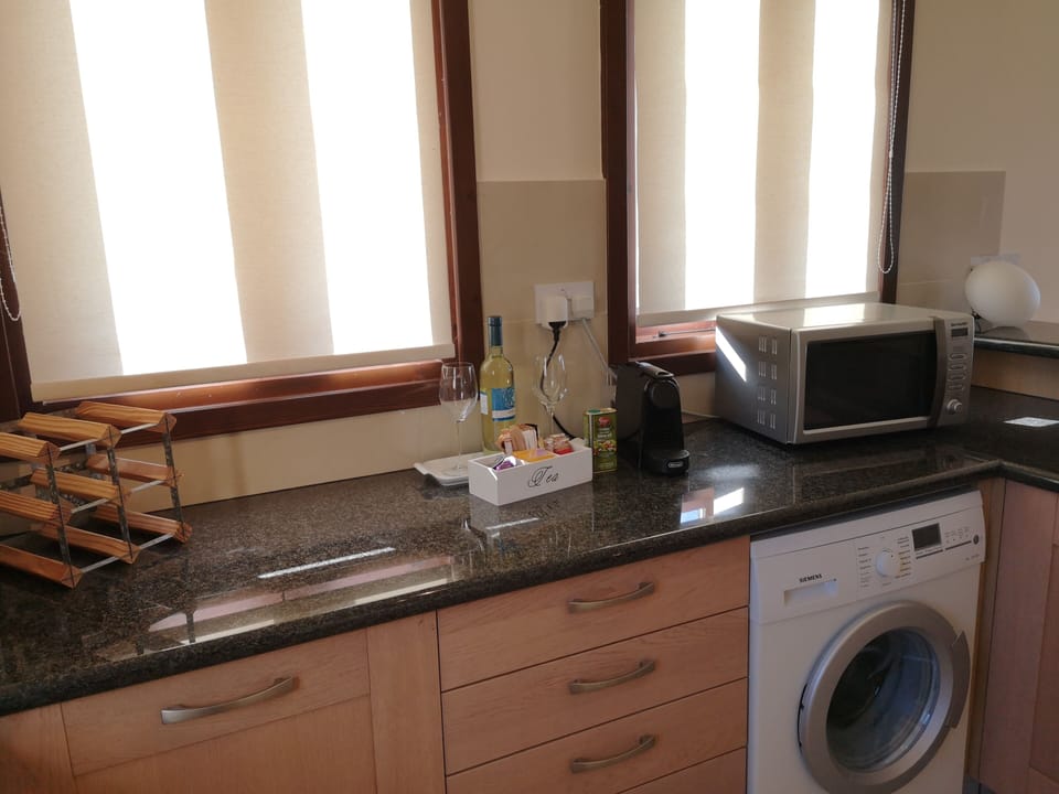 Nespresso coffee machine, microwave, dishwasher, washing machine