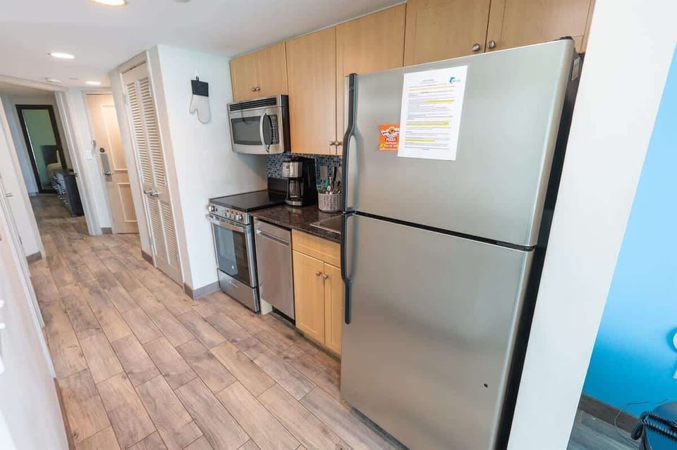 Full Sized Modern Appliances in Kitchen Area