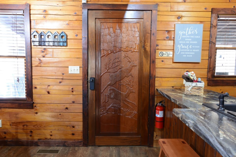 A view of the carved entry door from the great room. 